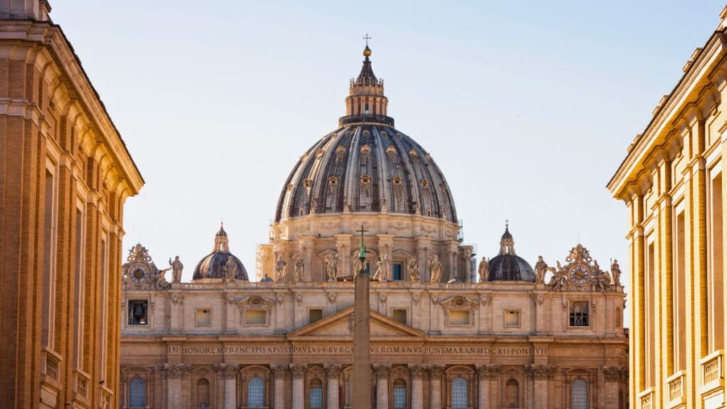 The grand structure of the Vatican, topped with a dome, symbolizes Italy's cultural luxury.