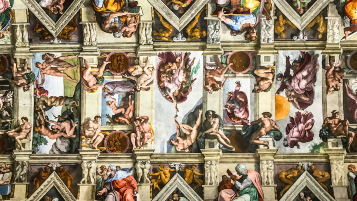 The stunning ceiling of the Sistine Chapel, featuring Michelangelo's masterful frescoes depicting religious narratives.