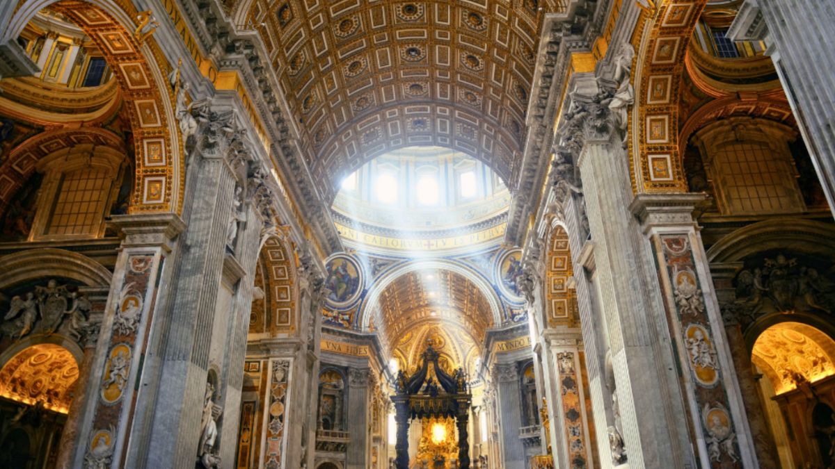 Sunlight streaming through the ornate interior of St. Peter’s Basilica, capturing the elegance of Italy Cultural Luxury.