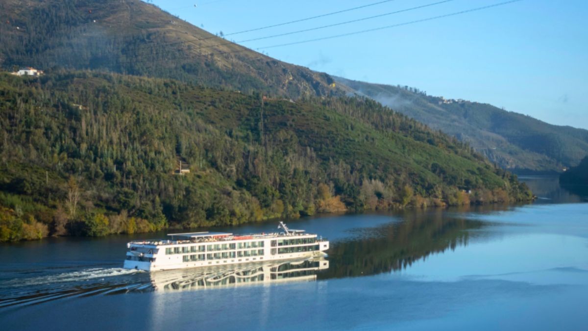 A ship traveling along the Magdalena River in Colombia, highlighting the beauty of an AmaWaterways cruise adventure.