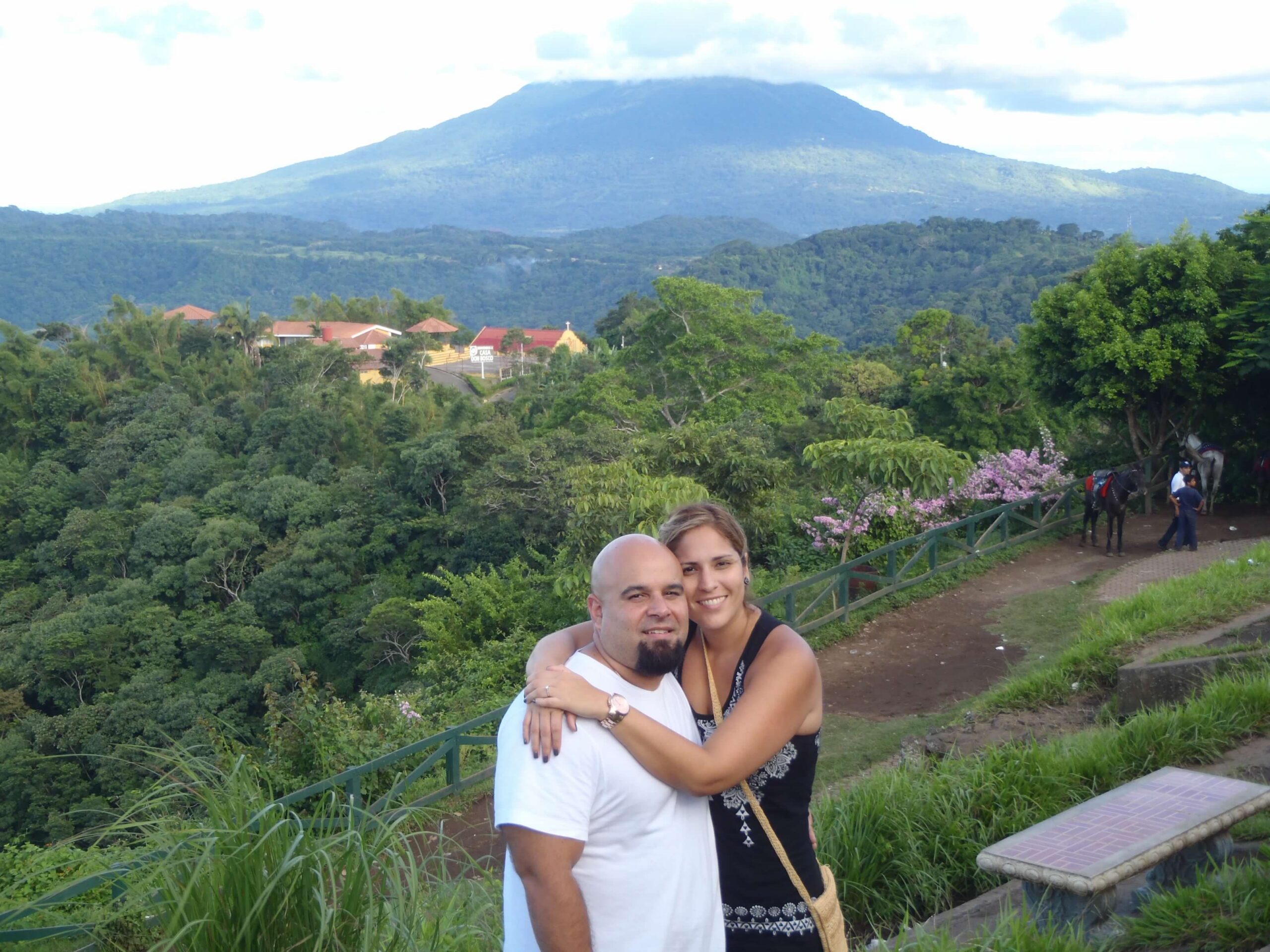 Barbie Villacis overlooking a hillside coastal town