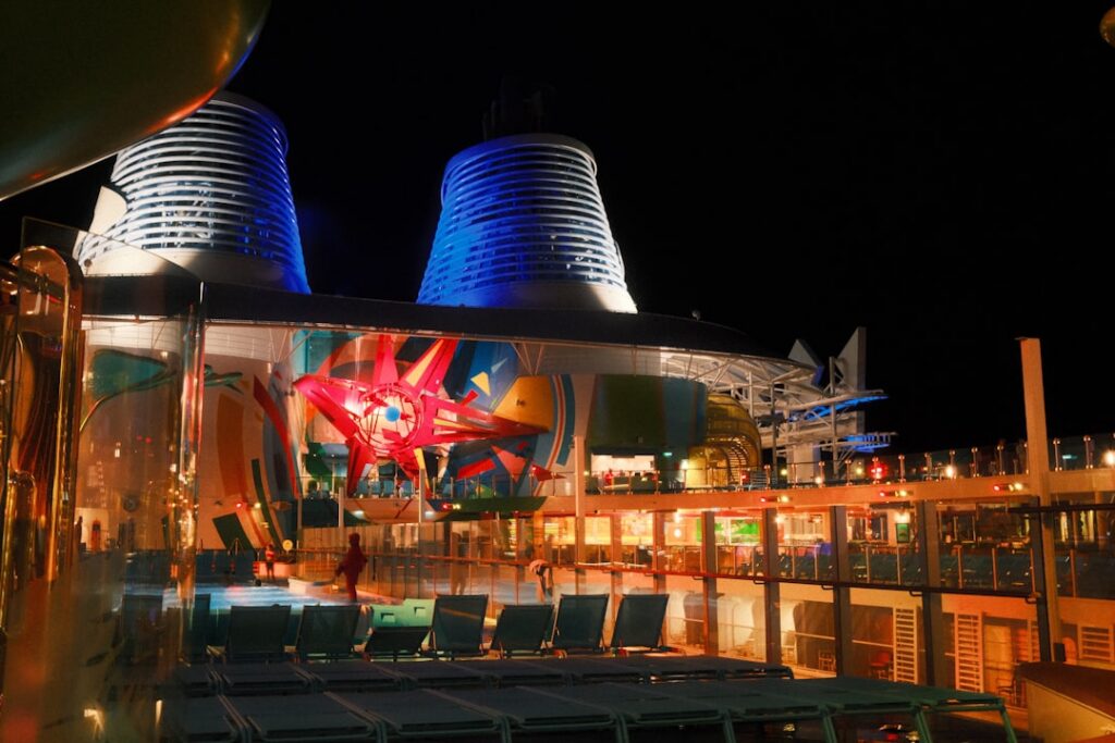 Luxury cruise ship deck at night, evoking the resort atmosphere aboard Explora III