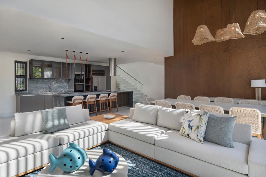 Double-height living room of the four-bedroom villa