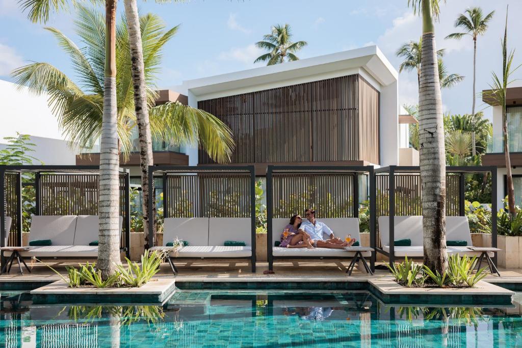 Poolside cabanas at Donoma