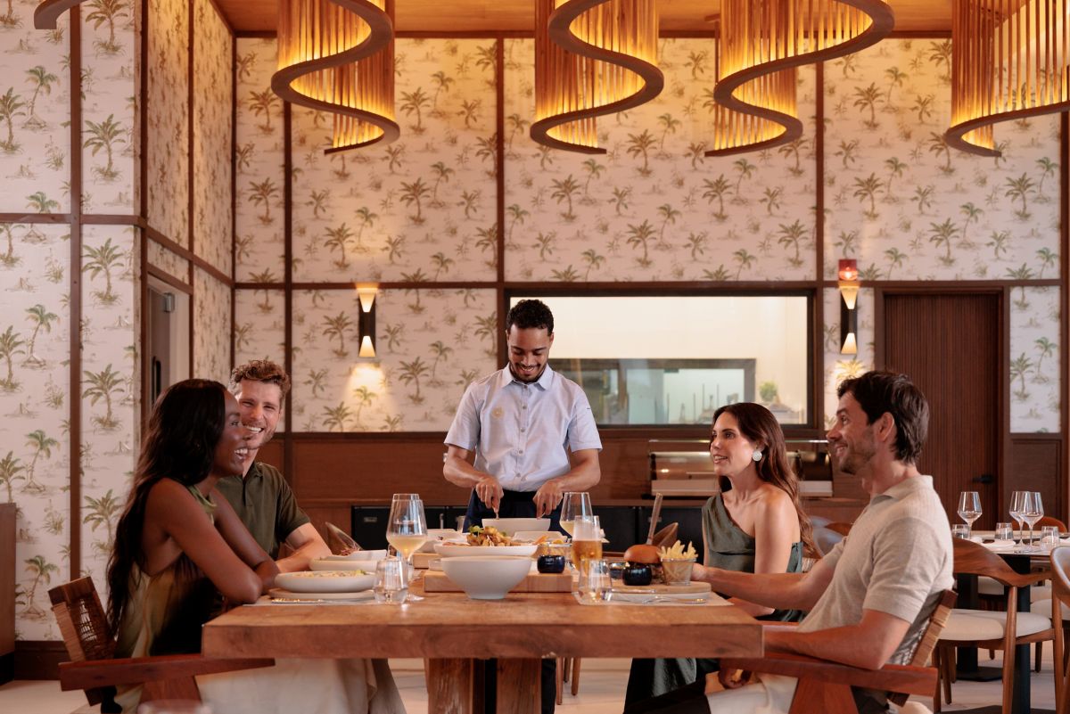 Guests enjoying a private chef-served dinner at Donoma Las Terrenas