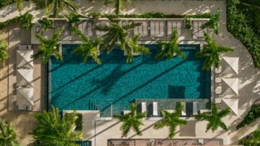 Aerial view of the resort pool at Donoma Las Terrenas