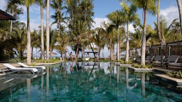 Yoga session on the lawn at Donoma Las Terrenas
