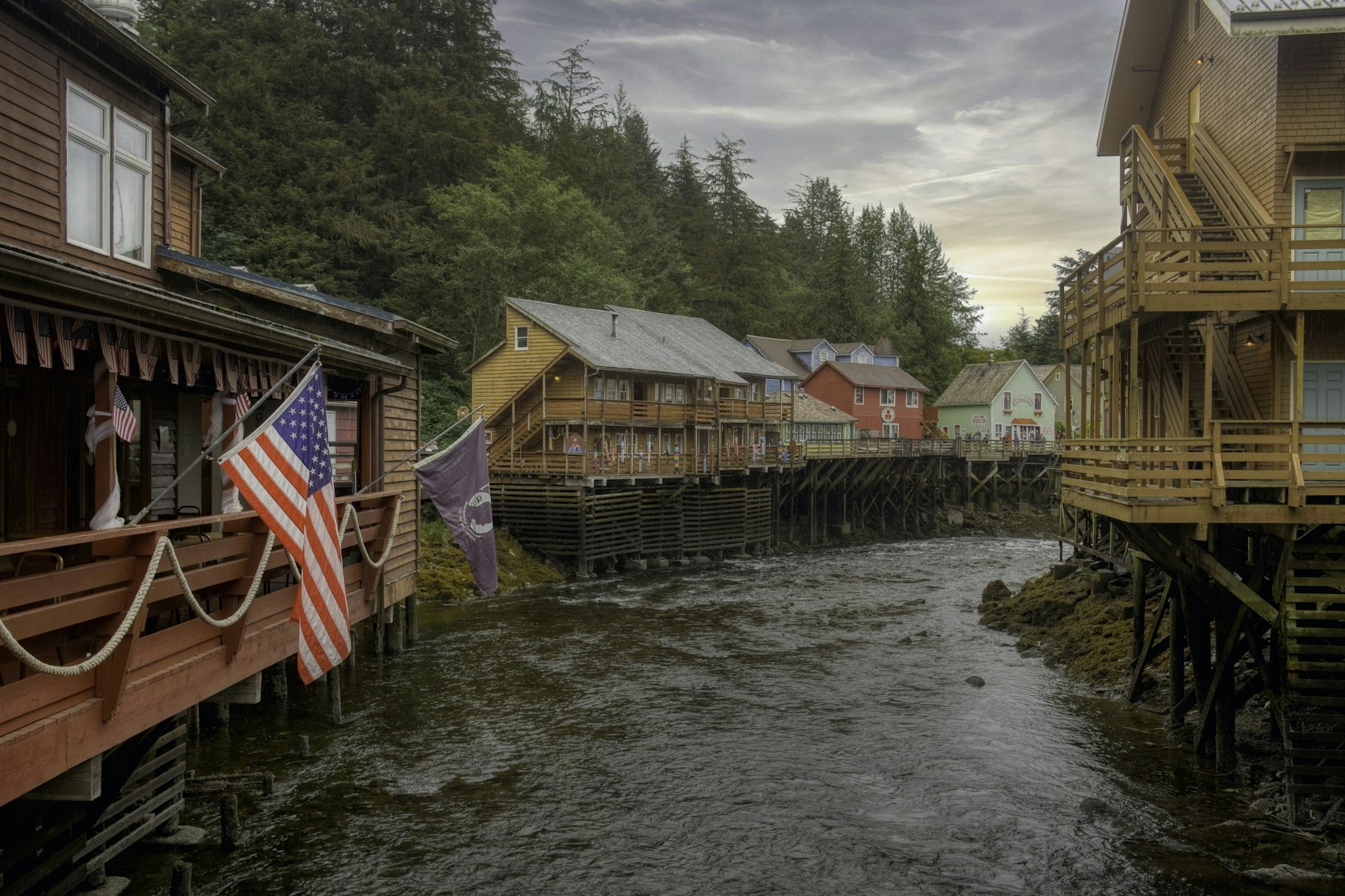 Wooden houses on stilts above Ketchikan Creek in Southeast Alaska, a first-day port on most Alaska cruise itineraries