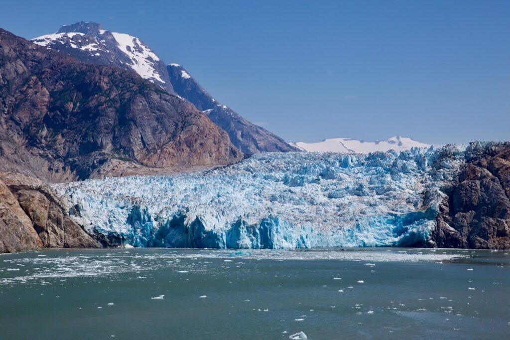 A tidewater glacier meeting the sea in Tracy Arm, the kind of glacier day that anchors an Alaska cruise itinerary through the Inside Passage