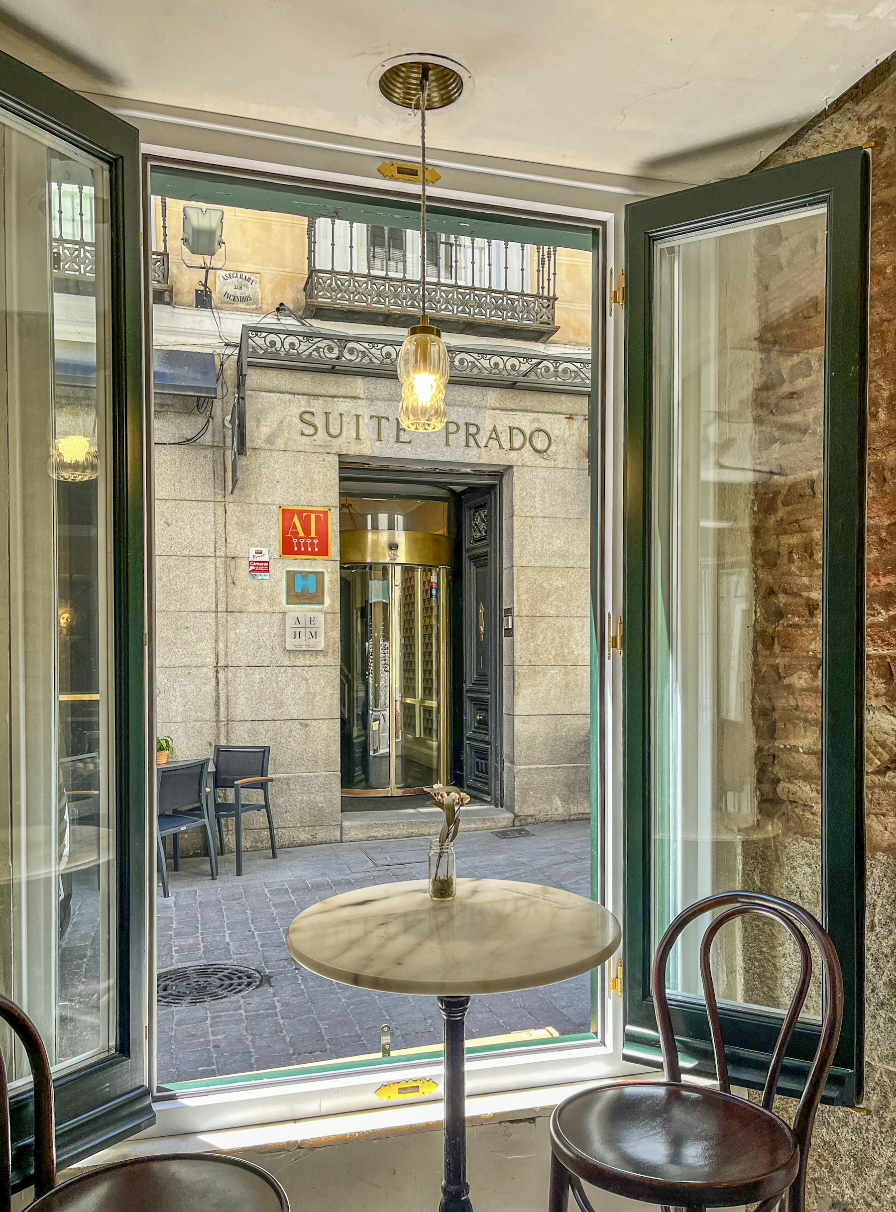 A Madrid street cafe scene, the kind of evening that fills a Champions League final 2027 trip either side of the match