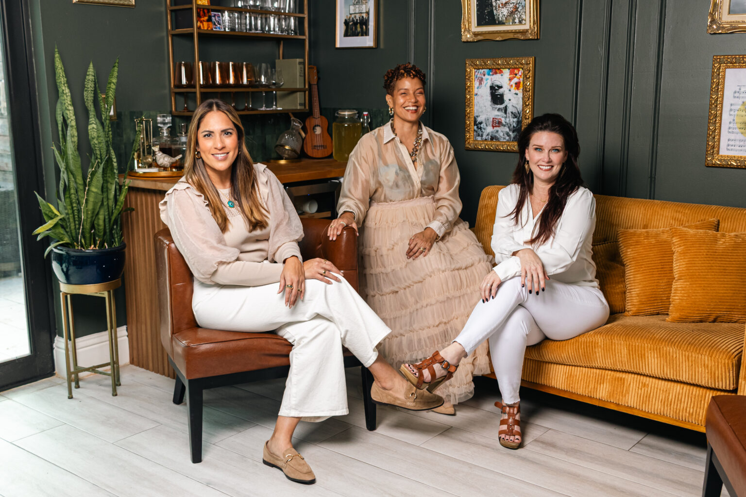 Our travel specialists: the Dorian Destinations travel advisor team laughing together in a candid studio photo