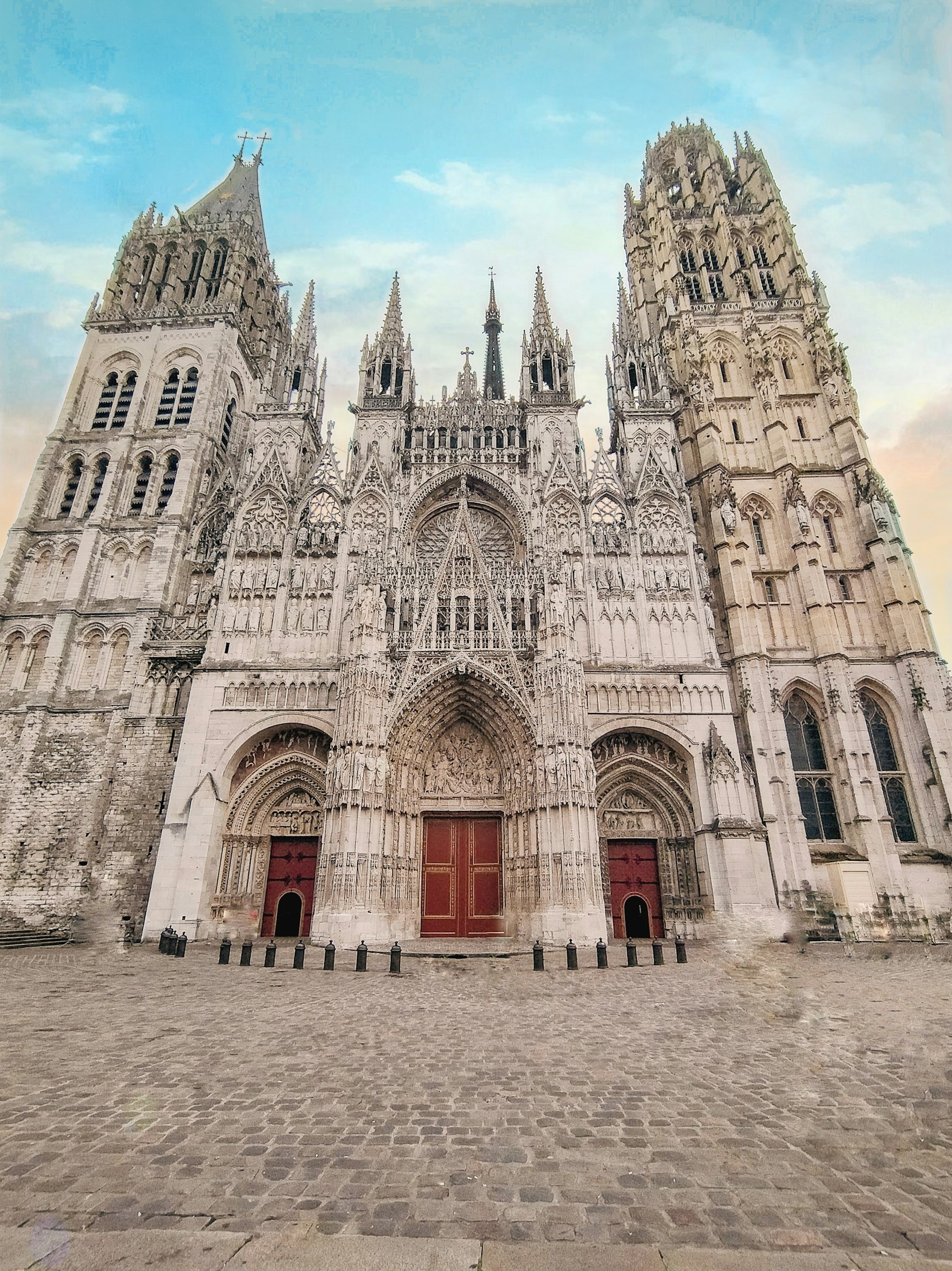 Seine River Cruise: Spend the Week Downstream, Not in Paris 3 The west front of Rouen Cathedral above an empty cobbled square, the mid-river stop on a Seine river cruise.