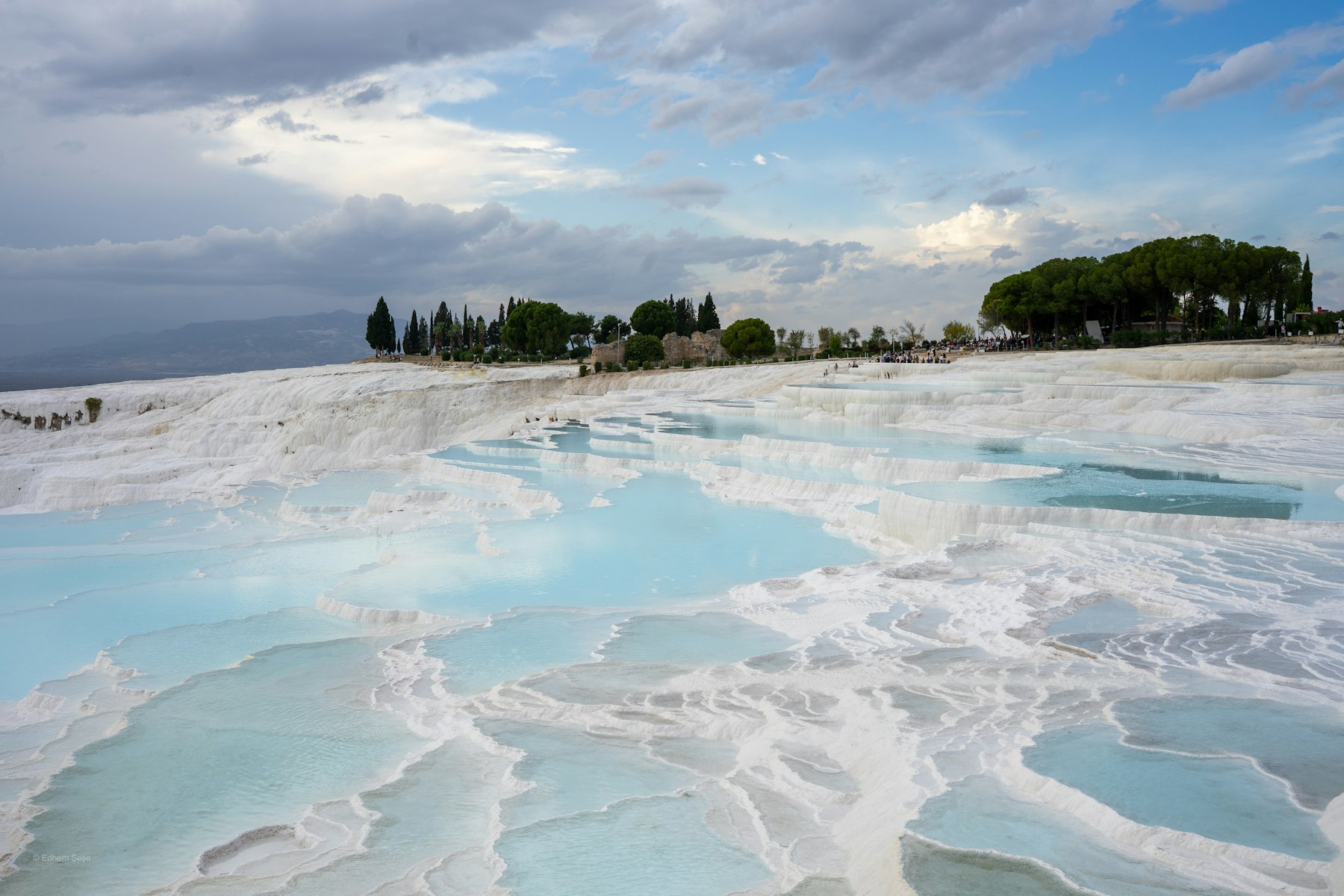 The white travertine terraces and turquoise pools at Pamukkale, among the most recognisable things to do in Turkey