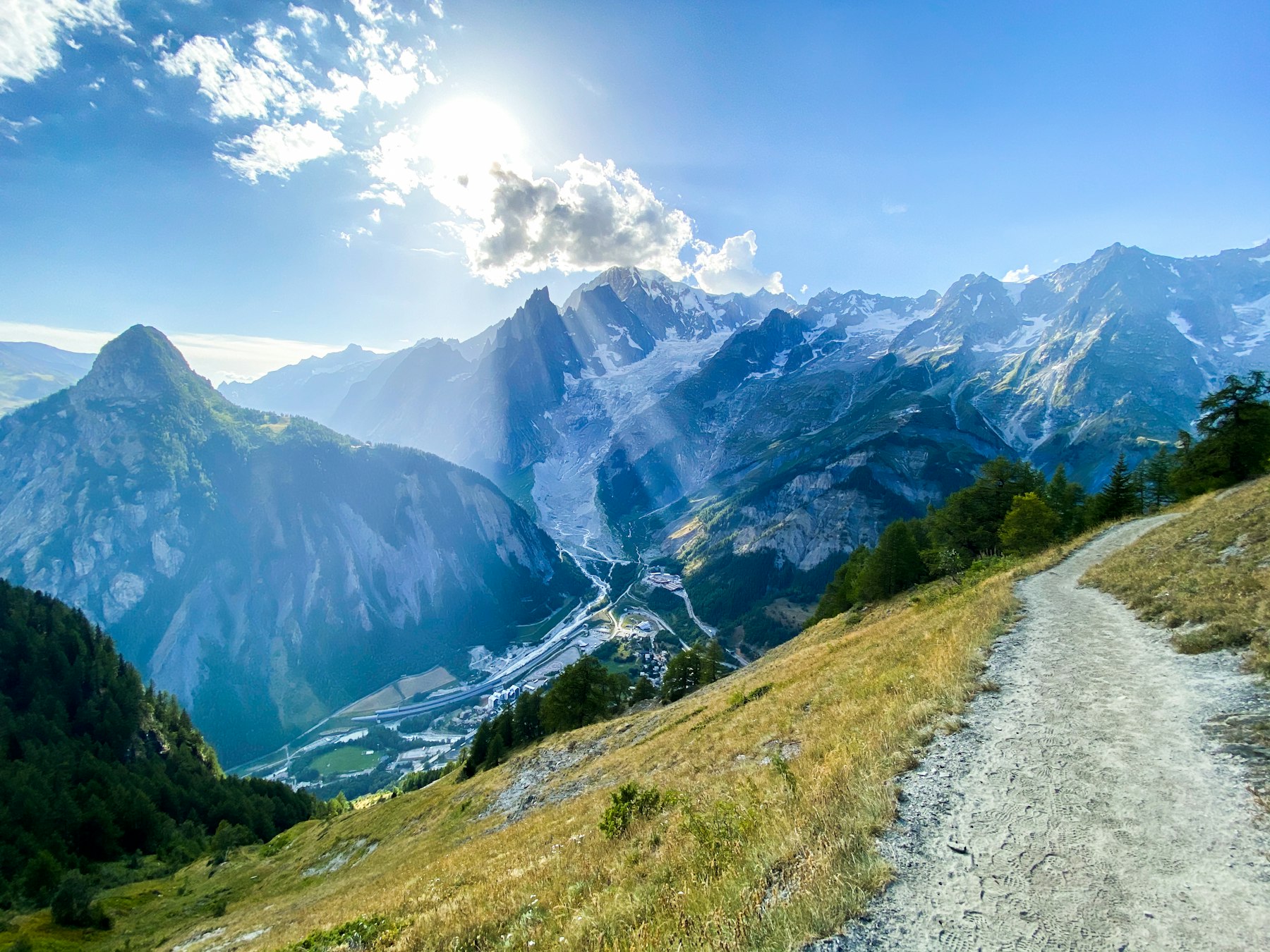 Tour du Mont Blanc: The Mountain Three Countries Can’t Agree On 3 The Val Veny balcony path above Courmayeur on the Tour du Mont Blanc, with the glaciated massif opposite